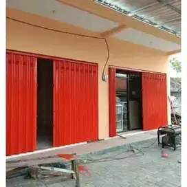 Folding gate rolling door