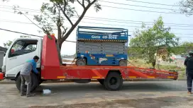 Harga rental scissor lift 12 meter