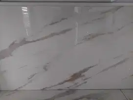 Keramik QUADRA 12 mm tebal nya . warna coklat muda dan warna abu tua