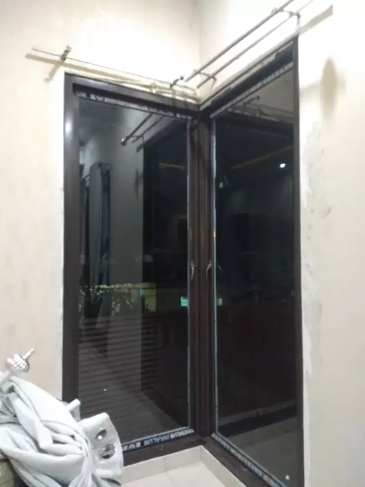 Tukang alumunium kaca