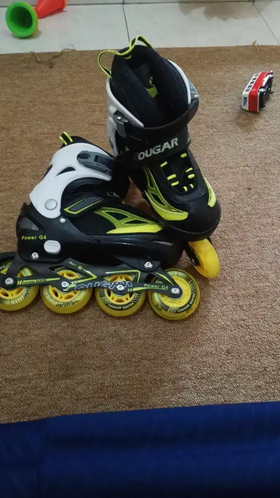 sepatu roda cougar