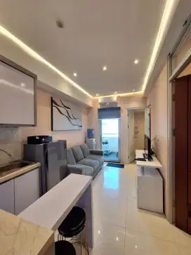 Apartman Gunawangsa tidar full Furnish jual rugi