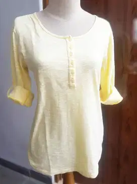 kaos kuning phenomenal
