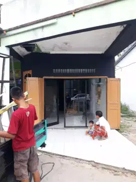 Pintu geser lipat sliding bukaan kupu tarung dobel pintu kaca