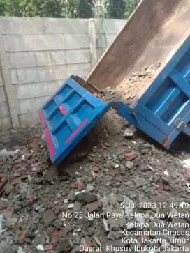 Pengurugan urug buang puing sampah urugan puing tanah merah campur