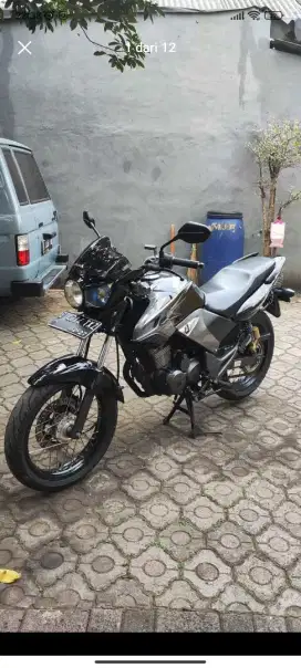 TIGER REVO HITAM PECE 2009