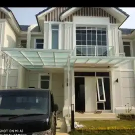 Canopy kaca desain rumah minimalis 890