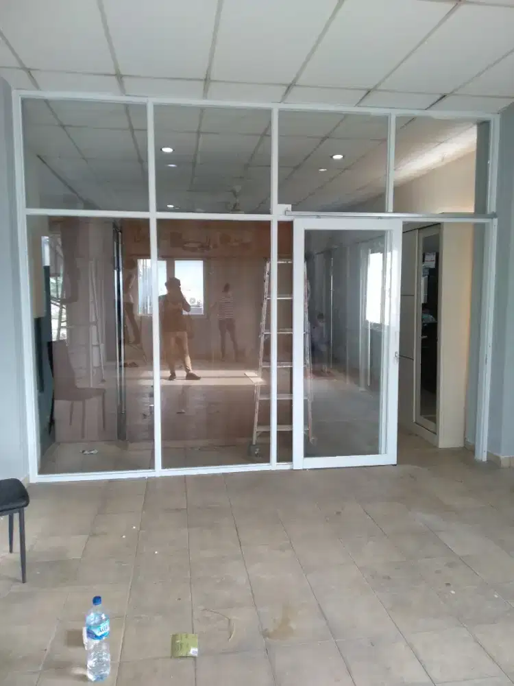 Tukang alumunium kaca