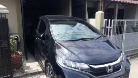 pasang kaca film mobil penolak panas UV