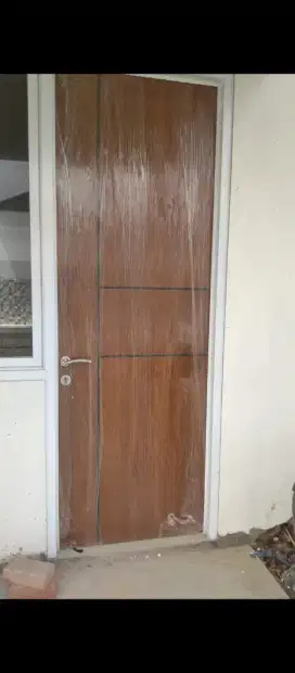 Daun pintu hpl bonus pemasangannya