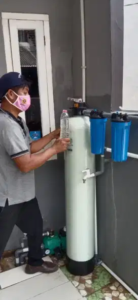 Filter saringan air warna kuning berminyak zat besi kapur keruh bau