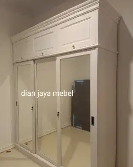 Lemari jati sliding putih Duco