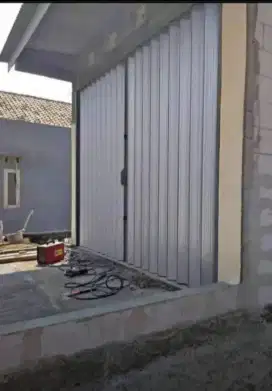 Rolling door folding gate
