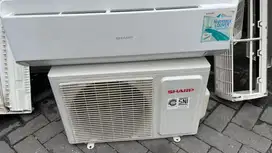 AC 1/2 PK sahrp harga plus pasang garansi 6 bulan