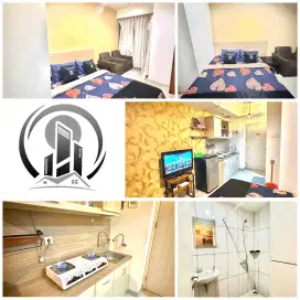 Staycation apartemen grand kamala lagoon