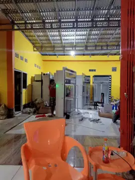 Isi ulang air minum usaha rumah tangga
