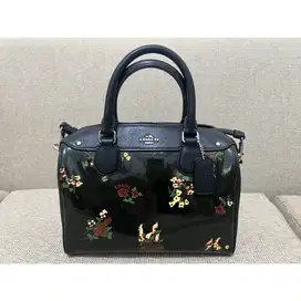 Tas COACH hitam motif bunga