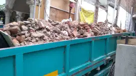 buang puing dan tanah merah sediakan urugan murah