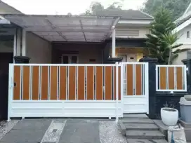 pagar besi kombinasi papan grc motif kayu