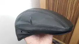 Topi pet kulit mulus