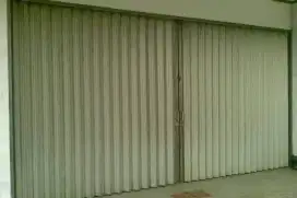 Folding gate roling door