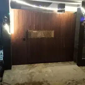 Pagar besi kombinasi kayu Ulin cutting