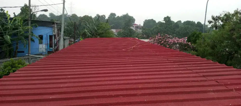 Pemasangan kanopi rumah rangka baja ringan atap spandek pasir