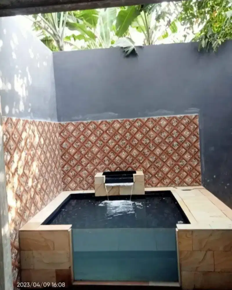 Pembuatan kolam koi minimalis