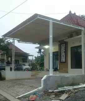 KANOPI/CANOPY BESI HOLLO. ATAP GALVALUM PASIR, UPVC ALDERON, SOLARFLAT