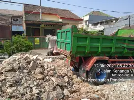 Buang puing sampah urugan puing tanah merah campur pengurugan urug