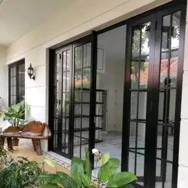 Pintu kaca lipat alumunium