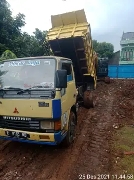 Puing tanah merah campur pengurug gali kolam taman buang puing sampah