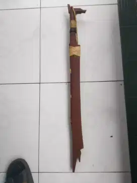 Mandau asli suku Dayak Benuaq gagang hulu tunggur