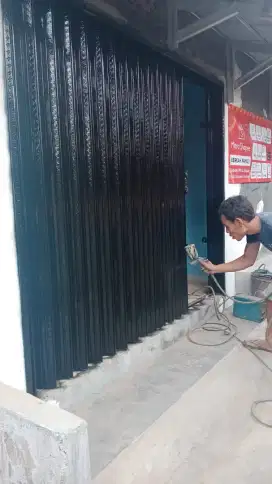 Folding gate rolling door