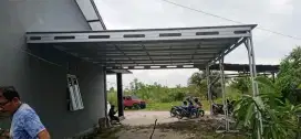 Pemasangan kanopi rumah rangka baja ringan atap spandek pasir