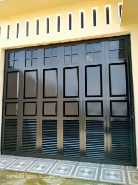 Pintu garasi rel tikung handerson