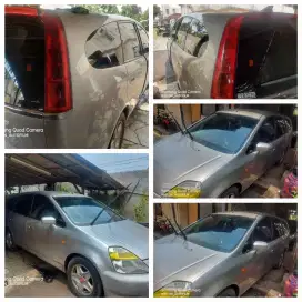kaca film mobil dan gedung murmer