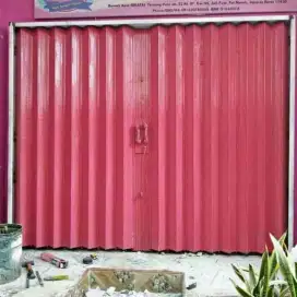 Rolling door folding gate