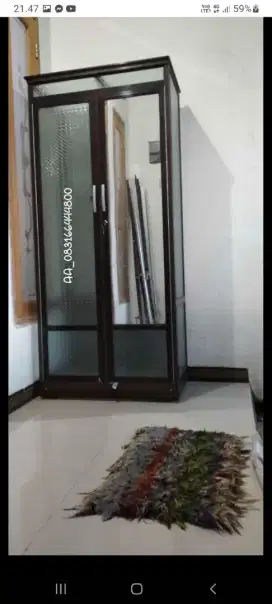 Lemari kaca alinium