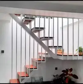 tangga revah besi holo galpamis ukuran 10/10 motip kayu