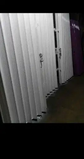 Folding gate rolling door