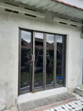 Pintu kaca lipat geser sleding aluminium kaca