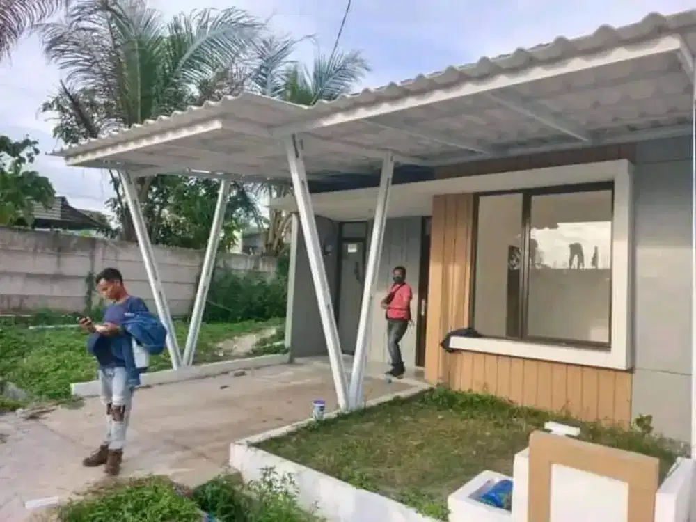 Pemasangan kanopi rumah rangka baja ringan atap spandek pasir