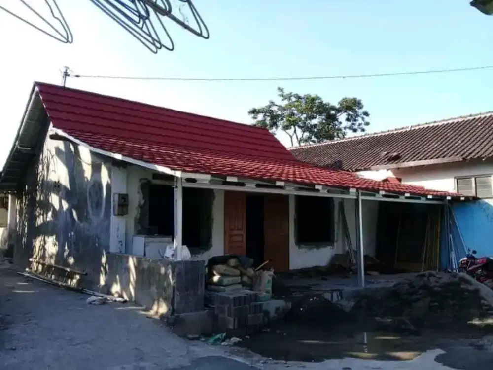 Genteng metal pasir rangka baja ringan