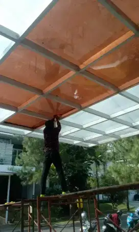 Kaca film dan sticker sunblast canopy rumah