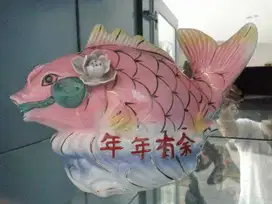 patung ikan nien nien you ie