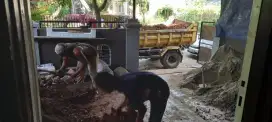 Tanah merah campur pengurugan urug buang puing sampah urugan puing