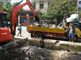 buang puing/sampah