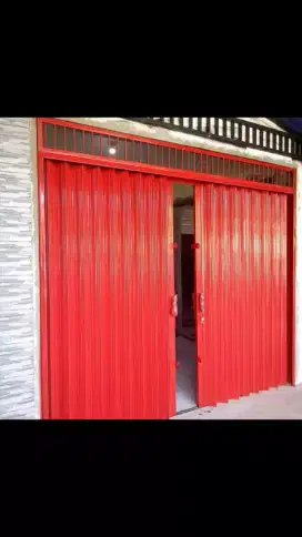 Tukang reparasi service rolling door folding gate murah