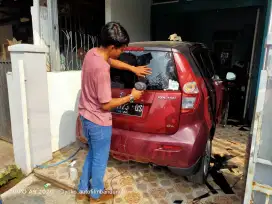 Kaca film murmer tolak panas